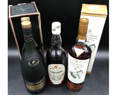Three bottles of spirits, one a bottle of Remy Martin Cognac, 2 x bottles of Highland Malt Scotch Whisky Glen Grant Distiller