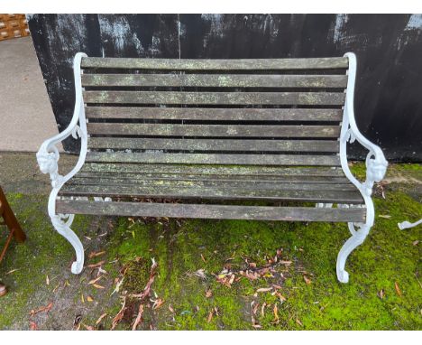 A decorative metal and wooden garden bench. 126cm w. 