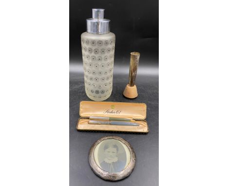 A miscellany to include an opaque glass cocktail shaker 27.5cm h, a hallmarked silver picture frame and engraved trophy vase 