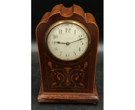 Inlaid mahogany mantle clock in the Art Nouveau style, 24 h x 16cm w, on four brass feet. 