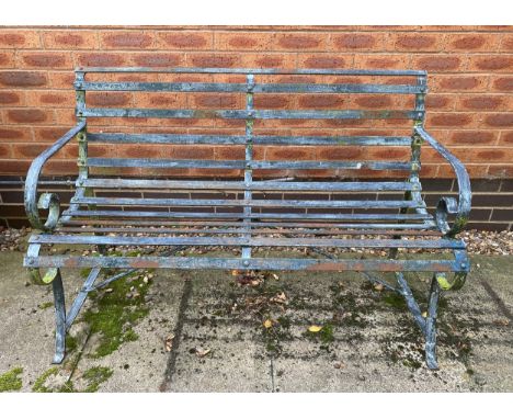 A heavy wrought iron bench. 