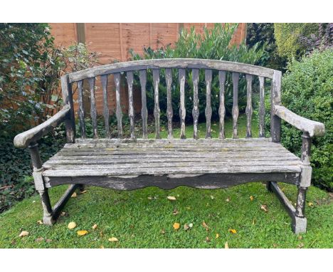 A wooden garden bench. 150 w x 96cm h. 