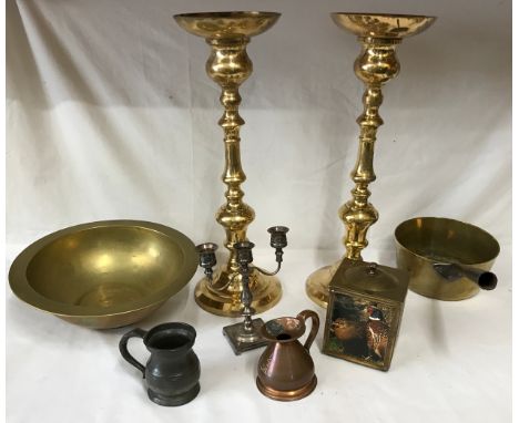 Collection of brass, copper and pewter to include two large candlesticks measuring 50cm h, a round brass bowl 31cm diameter, 