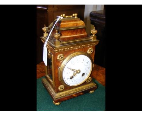 A decorative French mantle clock with enamelled dial - H20cm