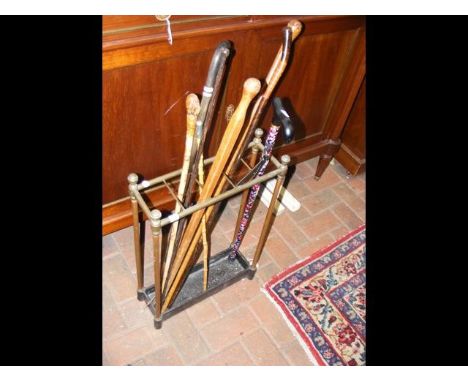 A stick stand containing various sticks