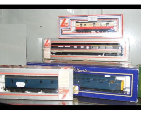 A selection of boxed Lima and other carriages and locomotives