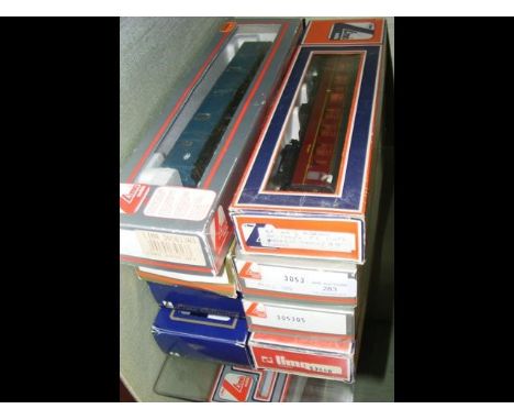A selection of boxed Lima and other carriages