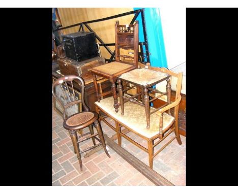 An Edwardian two seater settee, a child's high back chair, together with a stool