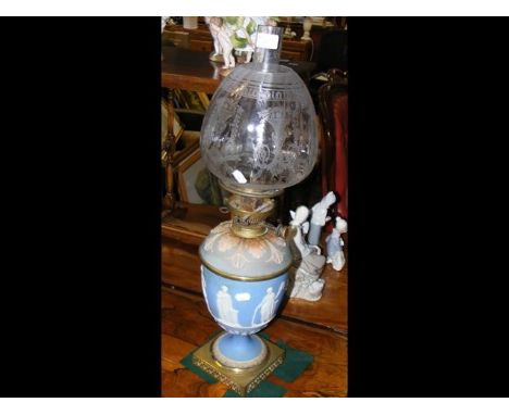 A blue and white Jasperware oil lamp with acid etched glass shadeCONDITION REPORTno signs of damage, discoloured-as shown in 