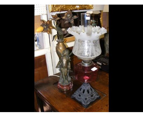 A Victorian oil lamp together with a table lampCONDITION REPORTseem fineno damage found apart from a couple small minor nicks