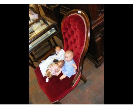 A Victorian button back easy chair