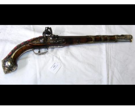 An antique Spanish flint lock pistol having white metal and enamel decoration  - 54cm longCONDITION REPORTas per images, repa