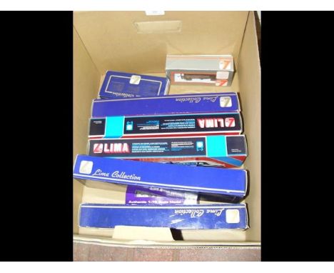 A selection of boxed Lima carriages etc