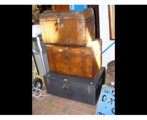 Two old metal trunks, together with a wooden trunk