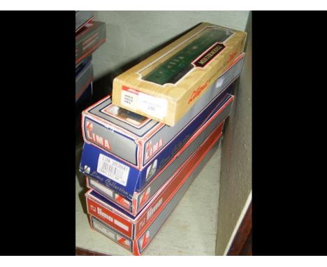 A selection of boxed Lima and other carriages