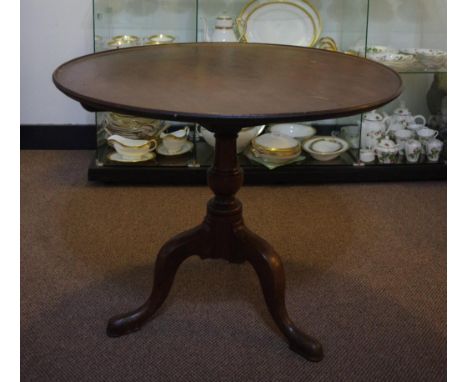 George III tilt top tripod table with revolving top, 89.5cm diameter, 70.5cm high