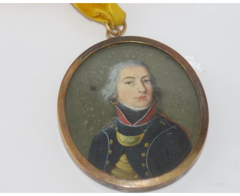 Antique handpainted portrait miniature of a officer in uniform, set in gilt surround.