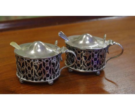 Pair of Hardy Bros sterling silver mustard pots with pierced sides & blue glass liners, hallmarked Birmingham 1913 together w