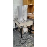 Gordian Semi-automatic strapping machine. Model: D53, No: 534306003, 240 volt (EXCLUDING Shrink wrap