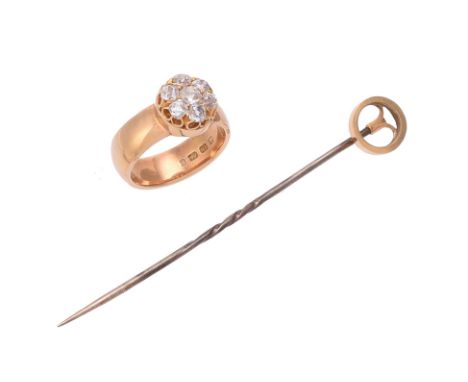 A Victorian diamond cluster ring with stick pin fitting, the 18 carat gold broad shanked ring with a removable old mine cut d