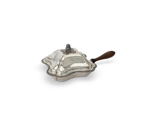 A late George III silver shaped square vegetable dish, divider and cover by Richard Sibley I, London 1817, with a leafy bud f