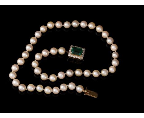 An emerald, diamond and cultured pearl necklace retailed by Boucheron, the clasp with a step cut emerald with canted corners,