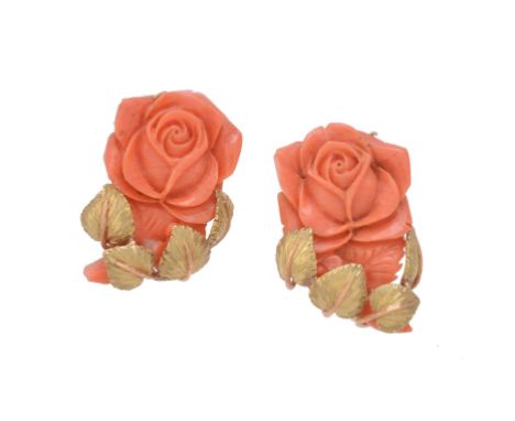 Y A pair of carved coral earrings, the coral carved as blooming roses, with two colour leaf detail, with stud and clip fittin