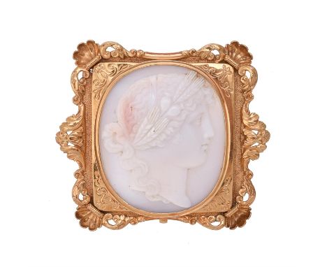 An 1880s hardstone cameo of Persephone, the oval panel carved with the profile of Persephone wearing a wreath of wheat and po