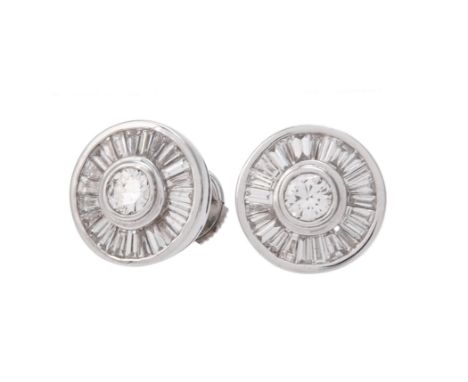 A pair of diamond cluster earrings, the central brilliant cut diamonds, estimated to weigh 0.46 carats total, collet set with