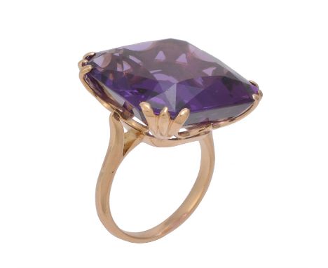 An French Art Nouveau early 20th century amethyst dress ring, circa 1900, the mixed cut amethyst with a trio of claws to each