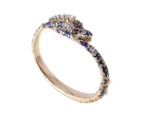 A mid Victorian and later diamond serpent hinged bangle, the coiled serpent with scrolled foliate blue enamel decoration, the