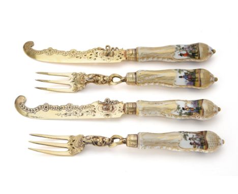 A set of six 19th century German silver gilt and Dresden porcelain dessert knives and forks, no maker's marks, the blades sta