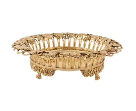 A George IV silver gilt circular dessert basket by William Eley & William Fearn, London 1823, the overlapping wirework sides 