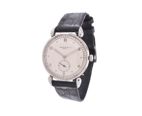 Patek Philippe, ref. 1461, a stainless steel wrist watch, no. 626517 910864, circa 1940, manual wind movement, 18 jewels, adj