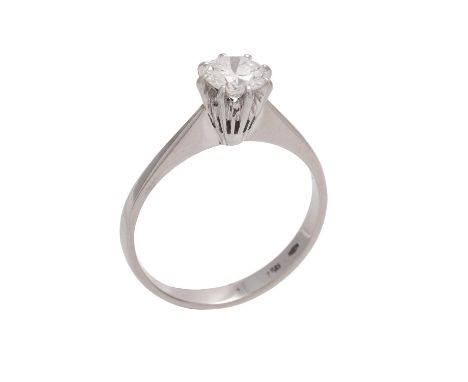 A single stone diamond ring, the brilliant cut diamond estimated to weigh 0.65 carats, within eight claw settings, finger siz