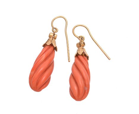 Y A pair of coral drop ear pendants, the carved coral drops each below a gold coloured cap with an eight cut diamond surmount