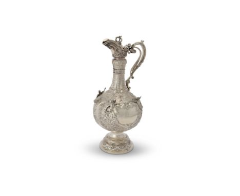 An over-sized late Victorian silver Armada pattern claret jug by Sibray, Hall & Co. Ltd., London 1899, of typical form, with 