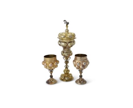 A German silver parcel gilt cup and cover, pseudo Breslau marks, probably Hanau circa 1900, in early 17th century style, with