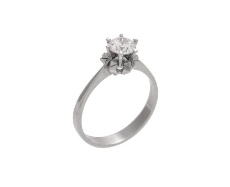 A single stone diamond ring, the brilliant cut diamond estimated to weigh 0.80 carats total, to a geometric raised claw setti