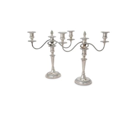 A pair of silver circular three light candelabra by Barker Ellis Silver Co., Birmingham 1966, with detachable central flame f
