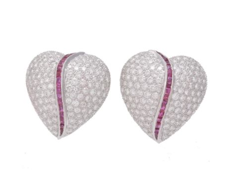 A pair of ruby and diamond heart shaped ear clips, the pavé set brilliant cut diamond panels, approximately 5.32 carats total