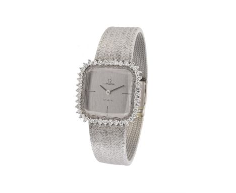 Omega, De Ville, ref. 8266, a lady's white gold coloured and diamond bracelet watch, no. C73286, circa 1970, manual wind move