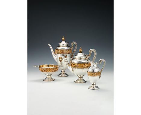 Y A matched Victorian silver parcel gilt vase shaped four piece tea and coffee service by Stephen Smith, the coffee pot maker