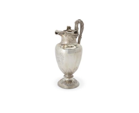 A William IV silver ovoid pedestal claret jug by Edward, Edward junior, John & William Barnard, London 1831, with a high frui
