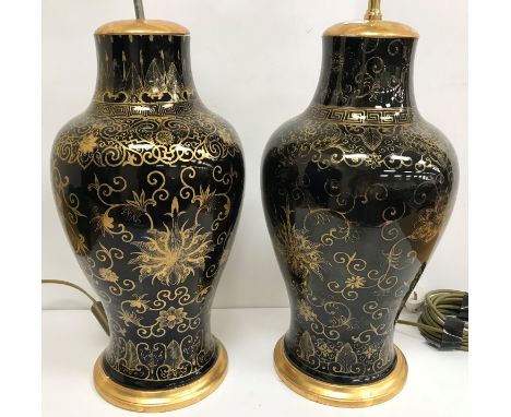 A pair of 19th century Chinese mirror black (Wujin) balaster shaped vases with all over scrolling foliate and floral decorati