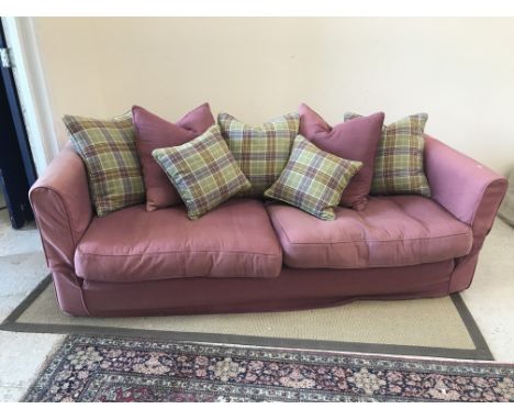 A modern burgundy upholstered sofa with green and burgundy check cushions, 220 cm wide x 98 cm deep x 67 cm high, together wi