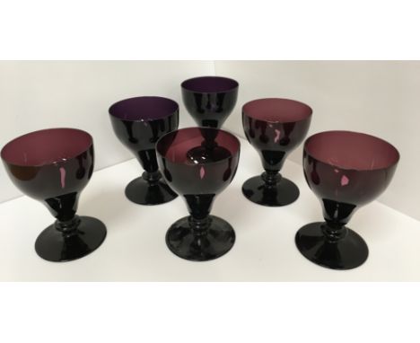 A collection of William Yeoward glassware to include a set of six amethyst rummers 9.8 cm diameter x 13.6 cm high, a clear gl