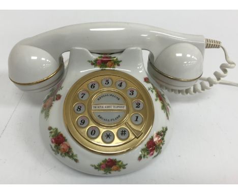A large quantity of Royal Albert Old Country Roses china wares including vases, thimbles, bells, dinner and tea wares, cups, 
