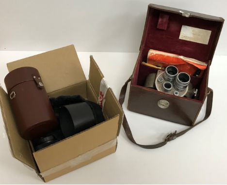 A Bell &amp; Howell 605 Double Run 8 cine camera, boxed, with instruction manual, a Praktica Super TL1000 camera, a Tamron As