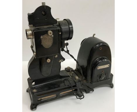 A Pathé Baby Projector by Contin Souza Paris, Type MBY, Serial No. 1978, together with one bottle Pathé baby oil, box contain